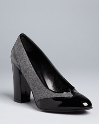 These Delman pumps are classic but trend-right, with fashionable menswear influences and polished almond toes. These Delman pumps are classic but trend-right, with fashionable menswear influences and polished almond toes.