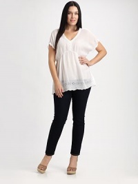 A heavenly tunic featuring lovely lace trim, a flattering neckline and a classic Empire waist that will complement your shape.V-necklineShort sleevesEmpire waistEmbroidered trimScalloped hemAbout 32 from shoulder to hemRayonMachine washImported A heavenly tunic featuring lovely lace trim, a flattering neckline and a classic Empire waist that will complement your shape.V-necklineShort sleevesEmpire waistEmbroidered trimScalloped hemAbout 32 from shoulder to hemRayonMachine washImported