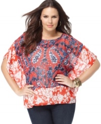 Refresh your casual look for the season with MICHAEL Michael Kors' batwing sleeve plus size top, showcasing a vibrant mixed print. Refresh your casual look for the season with MICHAEL Michael Kors' batwing sleeve plus size top, showcasing a vibrant mixed print.