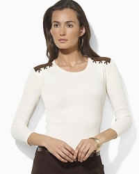 Cut in a relaxed, feminine silhouette, a supremely soft ribbed cotton top is finished with faux-suede patches and stitching at the shoulders for a chic, rustic vibe. Cut in a relaxed, feminine silhouette, a supremely soft ribbed cotton top is finished with faux-suede patches and stitching at the shoulders for a chic, rustic vibe.