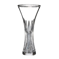 The vertical cuts tracing the neck of this traditional Waterford crystal vase reflect light with singular prismatic opulence. The vertical cuts tracing the neck of this traditional Waterford crystal vase reflect light with singular prismatic opulence.