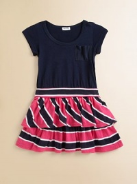 A simple frock gets a darling update with bold, contrasting stripes and a tiered, ruffled hem.ScoopneckShort sleevesPullover styleFront patch pocketBanded waistFull ruffled skirt50% cotton/50% modalMachine washImported A simple frock gets a darling update with bold, contrasting stripes and a tiered, ruffled hem.ScoopneckShort sleevesPullover styleFront patch pocketBanded waistFull ruffled skirt50% cotton/50% modalMachine washImported