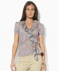 Light-as-air ruffles and a faded floral print lend vintage charm to Lauren Jeans Co.'s flattering wrap top in breezy woven cotton. Light-as-air ruffles and a faded floral print lend vintage charm to Lauren Jeans Co.'s flattering wrap top in breezy woven cotton.