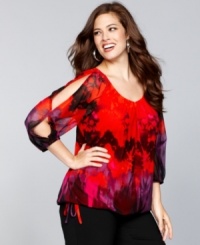 Turn up the heat with INC's plus size top. Split dolman sleeves and a colorful print create an eye-catching combination. Turn up the heat with INC's plus size top. Split dolman sleeves and a colorful print create an eye-catching combination.