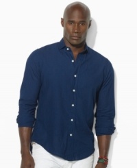 Crafted from dark-wash chambray, this essential button-down is cut for a relaxed, comfortable fit and finished with an Estate collar for a refined look. Crafted from dark-wash chambray, this essential button-down is cut for a relaxed, comfortable fit and finished with an Estate collar for a refined look.