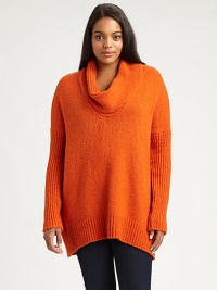 Unbelievably plush, a knit sweater with a feminine cowlneck and ribbed details. Pair this relaxed-fit design with your favorite skinnies.CowlneckLong sleevesDropped shouldersPull-on styleRibbed detailsAbout 30 from shoulder to hemAcrylic/nylon/cotton/woolHand washImported Unbelievably plush, a knit sweater with a feminine cowlneck and ribbed details. Pair this relaxed-fit design with your favorite skinnies.CowlneckLong sleevesDropped shouldersPull-on styleRibbed detailsAbout 30 from shoulder to hemAcrylic/nylon/cotton/woolHand washImported