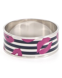 Make a statement with this MARC BY MARC JACOBS bangle. The classic black and white stripe pattern is interrupted with a bold lip print, making it unmistakably Marc. Make a statement with this MARC BY MARC JACOBS bangle. The classic black and white stripe pattern is interrupted with a bold lip print, making it unmistakably Marc.