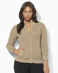 A classic mockneck cardigan receives a shimmering update from a luxe intertwining of cotton and Lurex®. A classic mockneck cardigan receives a shimmering update from a luxe intertwining of cotton and Lurex®.