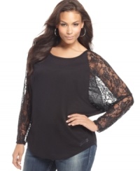 Sass up your look in Seven7 Jeans' plus size top, accented by lace sleeves. Sass up your look in Seven7 Jeans' plus size top, accented by lace sleeves.