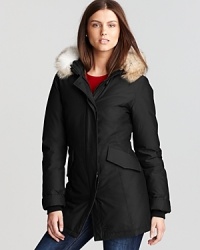 Warm down structured in a slim silhouette and finished with a plush fur removable hood: the WOOLRICH JOHN RICH & BROS arctic parka illuminates the chic side of winter. Warm down structured in a slim silhouette and finished with a plush fur removable hood: the WOOLRICH JOHN RICH & BROS arctic parka illuminates the chic side of winter.