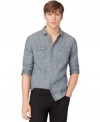 The chambray shirt is one of those timeless pieces that can be dressed up or down for an endless array of looks. This one by Calvin Klein Jeans is comfortable, contemporary and cool.