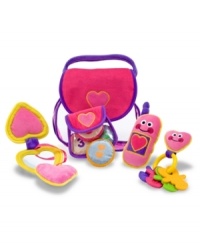Everything necessary for the little girl-on-the-go fits into this pretty purse! This soft play set includes a cell phone that chimes, a key-ring with keys, a change purse with coins and a compact with a child-safe mirror. Everything is easily removed and replaced into the charming pink purse with a purple handle. This durable set will provide hours of pretend fun! Everything necessary for the little girl-on-the-go fits into this pretty purse! This soft play set includes a cell phone that chimes, a key-ring with keys, a change purse with coins and a compact with a child-safe mirror. Everything is easily removed and replaced into the charming pink purse with a purple handle. This durable set will provide hours of pretend fun!