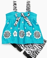Uncage her wild side with fun style in this zebra-print tank and short set from Nannette. Uncage her wild side with fun style in this zebra-print tank and short set from Nannette.