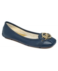 A dramatic designer logo at the toe of the MICHAEL by Michael Kors' Saffiano moc flats makes sure that boring is never an option. A dramatic designer logo at the toe of the MICHAEL by Michael Kors' Saffiano moc flats makes sure that boring is never an option.