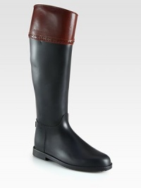 A durable rubber essential with soft leather trim and classic perforated details. Shaft, 16Leg circumference, 14Rubber upper with leather trimPull-on styleNylon liningRubber solePadded insoleMade in Italy A durable rubber essential with soft leather trim and classic perforated details. Shaft, 16Leg circumference, 14Rubber upper with leather trimPull-on styleNylon liningRubber solePadded insoleMade in Italy