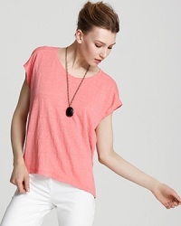 This Eileen Fisher boxy top embodies effortless ease in a relaxed silhouette in light-as-air linen. This Eileen Fisher boxy top embodies effortless ease in a relaxed silhouette in light-as-air linen.