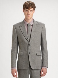 A salt and pepper tweed design in a tailored silhouette with contemporary button accents. Notch lapel with decorative buttons Front double button closureLong button cuff sleeves Tailored seams Chest welt pocket Front flap pockets Back vented hemAbout 29 from shoulder to hem 40% viscose/30% wool/20% polyester/10% silk Machine wash Made in USA A salt and pepper tweed design in a tailored silhouette with contemporary button accents. Notch lapel with decorative buttons Front double button closureLong button cuff sleeves Tailored seams Chest welt pocket Front flap pockets Back vented hemAbout 29 from shoulder to hem 40% viscose/30% wool/20% polyester/10% silk Machine wash Made in USA