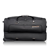 Ideal for recreational adventures or two traveling together, this extra-large wheeled duffel has an interior curtain that divides the case and can be unzipped to create one large packing space. The duffel collapses for easy storage. Ideal for recreational adventures or two traveling together, this extra-large wheeled duffel has an interior curtain that divides the case and can be unzipped to create one large packing space. The duffel collapses for easy storage.