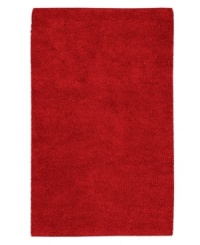 Red alert. A vivid hue makes a bold statement in any space, punctuating your decor in striking style. Hand-woven in India, this plush area rug from Surya is luxuriously rendered in indulgently soft New Zealand felted wool. Red alert. A vivid hue makes a bold statement in any space, punctuating your decor in striking style. Hand-woven in India, this plush area rug from Surya is luxuriously rendered in indulgently soft New Zealand felted wool.