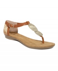 Invoke the coolness of the coast. Alfani's Heather flat sandals feature shells along the strap and a woven back that makes these thongs super season-appropriate. Invoke the coolness of the coast. Alfani's Heather flat sandals feature shells along the strap and a woven back that makes these thongs super season-appropriate.