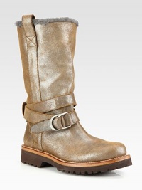 Cold weather essential made of glitter-coated leather with shearling lining and a wrap-around ankle strap. Rubber heel, 1½ (40mm)Rubber platform, ¾ (20mm)Compares to a ¾ heel, (20mm)Shaft, 10¾Leg circumference, 14Glitter-coated leather upperSide pull-tabs and adjustable ankle strapShearling linedRubber trek solePadded insoleMade in ItalyOUR FIT MODEL RECOMMENDS ordering true size. Cold weather essential made of glitter-coated leather with shearling lining and a wrap-around ankle strap. Rubber heel, 1½ (40mm)Rubber platform, ¾ (20mm)Compares to a ¾ heel, (20mm)Shaft, 10¾Leg circumference, 14Glitter-coated leather upperSide pull-tabs and adjustable ankle strapShearling linedRubber trek solePadded insoleMade in ItalyOUR FIT MODEL RECOMMENDS ordering true size.