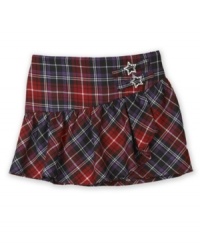 Hip. An asymmetrical cut gives a twist to the traditional plaid that decorates this stylish skirt from BCX. Hip. An asymmetrical cut gives a twist to the traditional plaid that decorates this stylish skirt from BCX.