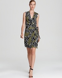 DIANE von FURSTENBERG puts a fresh spin on her iconic wrap dress with a sleeveless silhouette and extra-bold print. DIANE von FURSTENBERG puts a fresh spin on her iconic wrap dress with a sleeveless silhouette and extra-bold print.