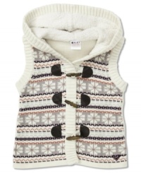 Layer her look with this pattern-print sweater vest from Roxy, lined with soft Sherpa lining. Layer her look with this pattern-print sweater vest from Roxy, lined with soft Sherpa lining.