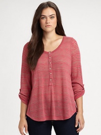 Sport this airy top featuring an ultra-feminine neckline, convenient roll-tab sleeves and a curved hem.V-neckRoll-tab sleevesButton placketCurved hemAbout 26 from shoulder to hemPolyester/rayonMachine washMade in USA Sport this airy top featuring an ultra-feminine neckline, convenient roll-tab sleeves and a curved hem.V-neckRoll-tab sleevesButton placketCurved hemAbout 26 from shoulder to hemPolyester/rayonMachine washMade in USA