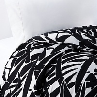 Keep it simple...or dress it up with color. This collection is white on black in a bold print. Leaves of giant grass grace this soft cotton duvet, complementing any modern bedroom. Keep it simple...or dress it up with color. This collection is white on black in a bold print. Leaves of giant grass grace this soft cotton duvet, complementing any modern bedroom.