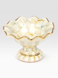 This one-of-a-kind centerpiece, crafted in lustrous, hand-painted terra cotta with color-dragged checks and golden trim, creates an understated and elegant presentation for your meal.Ceramic with golden lustre5.75 diam.4 tallHand washMade in the USA