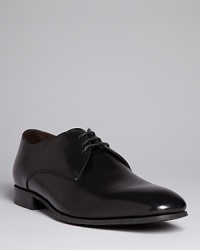 Superbly elegant lace-up shoes by To Boot New York lend polished poise to your look. Superbly elegant lace-up shoes by To Boot New York lend polished poise to your look.