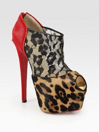 Stand out in a crowd with this leopard-print ankle boot rendered in lush calf hair and semi-sheer lace. Calf hair-covered heel, 6¼ (155mm)Hidden platform, 2½ (65mm)Compares to a 3¾ heel (95mm)Calf hair and lace upper with leather trimPeep toeBack zipLeather liningSignature red leather solePadded insoleMade in Italy Stand out in a crowd with this leopard-print ankle boot rendered in lush calf hair and semi-sheer lace. Calf hair-covered heel, 6¼ (155mm)Hidden platform, 2½ (65mm)Compares to a 3¾ heel (95mm)Calf hair and lace upper with leather trimPeep toeBack zipLeather liningSignature red leather solePadded insoleMade in Italy