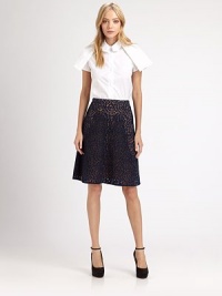 Crisp poplin shirt of pure cotton has modern shoulder overlays and a modified Peter Pan collar. Modified Peter Pan collarShort sleevesButton frontContour hem hits below the hipsCottonDry cleanImportedModel shown is 5'9 (176cm) wearing US size 4. Crisp poplin shirt of pure cotton has modern shoulder overlays and a modified Peter Pan collar. Modified Peter Pan collarShort sleevesButton frontContour hem hits below the hipsCottonDry cleanImportedModel shown is 5'9 (176cm) wearing US size 4.