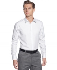 A time-honored classic. This vertical stripe long sleeve shirt by Calvin Klein should be a standard item in your closet. A time-honored classic. This vertical stripe long sleeve shirt by Calvin Klein should be a standard item in your closet.