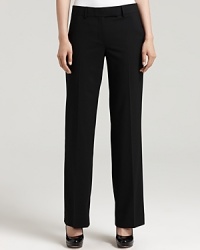 Streamline workday style in DKNY's perennial trousers. Finish the look with a sharp blazer for boardroom chic. Streamline workday style in DKNY's perennial trousers. Finish the look with a sharp blazer for boardroom chic.