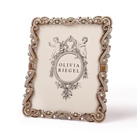 A rich frame of cast pewter in an antique brass finish with dozens of hand-set Swarovski® crystals, tiger's eye, and faux pearls make this a dazzling display for your favorite photos.