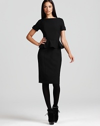 The epitome of classic elegance, this Burberry London dress touts the details that define daytime sophistication: cuffed sleeves with button closures and a ladylike peplum to accent your slim waistline. An exposed back zip finishes the look perfectly. The epitome of classic elegance, this Burberry London dress touts the details that define daytime sophistication: cuffed sleeves with button closures and a ladylike peplum to accent your slim waistline. An exposed back zip finishes the look perfectly.