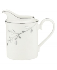 Birch branches grow around this pure white porcelain creamer, turning formal tables into serene landscapes. A contemporary design refined in polished platinum with a breezy, all-natural beauty. From Noritake's collection of serveware and serving dishes. Birch branches grow around this pure white porcelain creamer, turning formal tables into serene landscapes. A contemporary design refined in polished platinum with a breezy, all-natural beauty. From Noritake's collection of serveware and serving dishes.