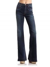 THE LOOKMid-width waistband with belt loopsLogo button closureZip flyLogo rivetsSide hand pocketsMinimal fading at waist and legsFlared legsBack logo patchTHE FITRise, about 10Inseam, about 33THE MATERIAL98% cotton/2% elastaneCARE & ORIGINMachine washMade in ItalyModel shown is 5'11 (180cm) wearing US size 4. THE LOOKMid-width waistband with belt loopsLogo button closureZip flyLogo rivetsSide hand pocketsMinimal fading at waist and legsFlared legsBack logo patchTHE FITRise, about 10Inseam, about 33THE MATERIAL98% cotton/2% elastaneCARE & ORIGINMachine washMade in ItalyModel shown is 5'11 (180cm) wearing US size 4.