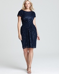 Encrusted in dazzling sequins, Tadashi Shoji Plus's brilliant dress lends a flattering fit with a gathered waist. Encrusted in dazzling sequins, Tadashi Shoji Plus's brilliant dress lends a flattering fit with a gathered waist.