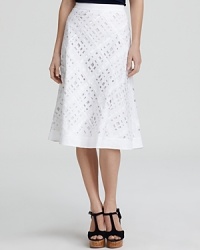 Touting unexpected cut-outs and a delicate ribbon weave, this Lafayette 148 New York skirt perks up your style with playful details. Touting unexpected cut-outs and a delicate ribbon weave, this Lafayette 148 New York skirt perks up your style with playful details.