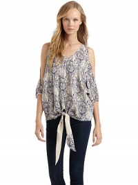 THE LOOKChinoiserie-inspired printV-neckCutout shouldersThree-quarter length dolman sleeves with banded cuffsTie-front waistTHE FITAbout 24 from shoulder to hemTHE MATERIALSilkContrast: rayonCARE & ORIGINDry cleanMade in USAModel shown is 5'8 (172½cm) wearing US size Small. THE LOOKChinoiserie-inspired printV-neckCutout shouldersThree-quarter length dolman sleeves with banded cuffsTie-front waistTHE FITAbout 24 from shoulder to hemTHE MATERIALSilkContrast: rayonCARE & ORIGINDry cleanMade in USAModel shown is 5'8 (172½cm) wearing US size Small.