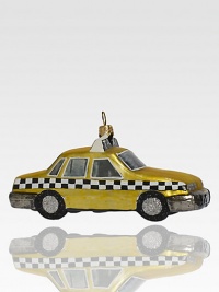 Although the real checker cabs no longer roam the city streets, this sparkling ornament recalls the heyday of these roomy roadsters, crafted of delicate glass with glitter wheels.Handmade and hand-paintedGlassAbout 5L X 2.75H X 2DImported Although the real checker cabs no longer roam the city streets, this sparkling ornament recalls the heyday of these roomy roadsters, crafted of delicate glass with glitter wheels.Handmade and hand-paintedGlassAbout 5L X 2.75H X 2DImported