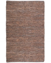 Olé! Spice up your decor with the gorgeously festive style of the Matador rug from St. Croix. Durable leather strips in warm, earthy hues are meticulously hand woven with fine cotton strands, resulting in a beautiful, rustic texture and natural braided pattern that accents even the most eclectic decor. Olé! Spice up your decor with the gorgeously festive style of the Matador rug from St. Croix. Durable leather strips in warm, earthy hues are meticulously hand woven with fine cotton strands, resulting in a beautiful, rustic texture and natural braided pattern that accents even the most eclectic decor.