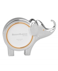 Remember his or her wildest moments in this Jungle Parade picture frame from Reed & Barton. A silver-plated elephant with cheery orange accents is a gift that'll please parents and kids alike. Remember his or her wildest moments in this Jungle Parade picture frame from Reed & Barton. A silver-plated elephant with cheery orange accents is a gift that'll please parents and kids alike.