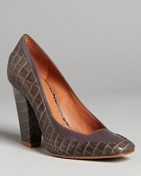 Chunky, embossed croc defines these square toe high heel pumps by designer Sigerson Morrison. They're a quick way to update your entire fall wear-to-work wardrobe-a distinctly modern classic. Chunky, embossed croc defines these square toe high heel pumps by designer Sigerson Morrison. They're a quick way to update your entire fall wear-to-work wardrobe-a distinctly modern classic.