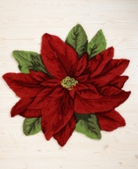 Evoking a traditional holiday feel, this Martha Stewart Collection accent rug features a poinsettia in festive red and green colors for a classic addition to your home. Evoking a traditional holiday feel, this Martha Stewart Collection accent rug features a poinsettia in festive red and green colors for a classic addition to your home.