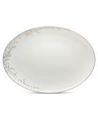 Fringed with shimmering leaves of platinum and mica, this bone china oval platter turns your table into a springtime utopia. Its sleek coupe shape is a vision of modern elegance in platinum-banded white. Fringed with shimmering leaves of platinum and mica, this bone china oval platter turns your table into a springtime utopia. Its sleek coupe shape is a vision of modern elegance in platinum-banded white.