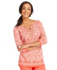 A tribal-inspired print peps up this crisp petite tunic from Charter Club. Skip the necklace -- beading at the neckline adds the right bit of sparkle! A tribal-inspired print peps up this crisp petite tunic from Charter Club. Skip the necklace -- beading at the neckline adds the right bit of sparkle!